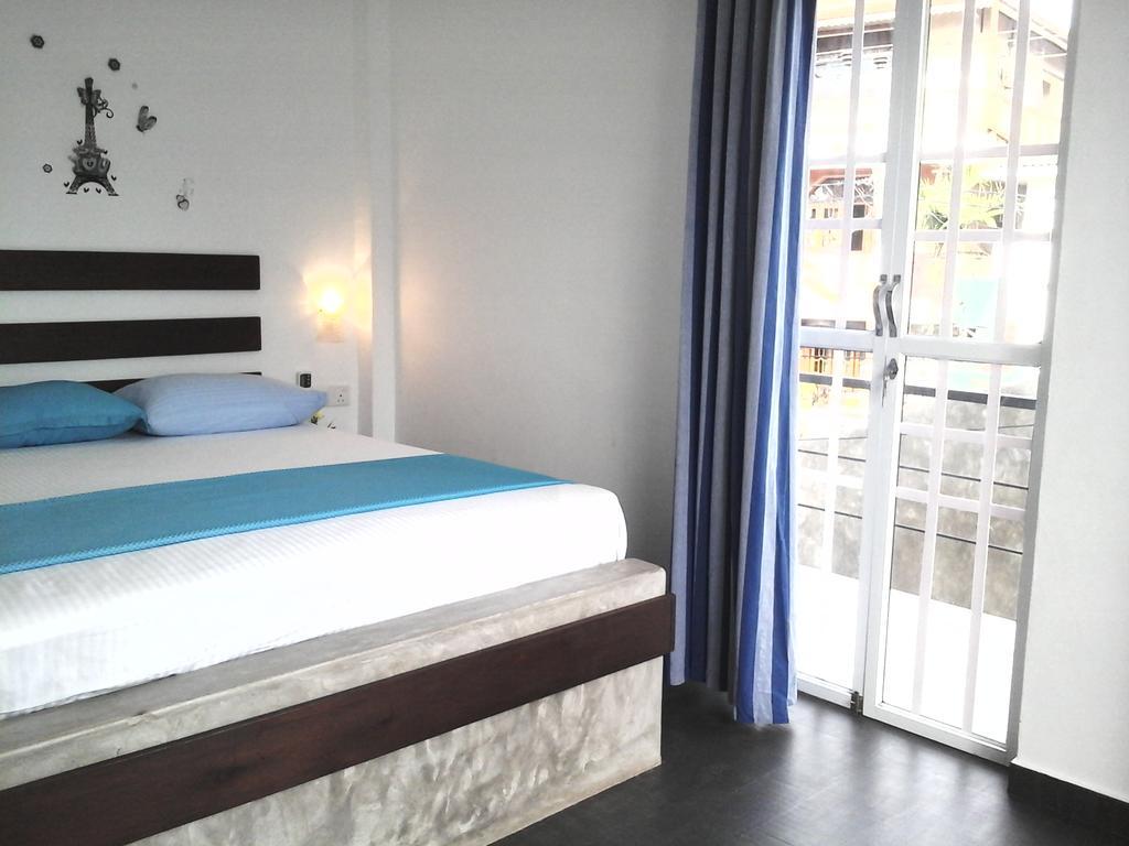 Petit Guest House Negombo Rum bild